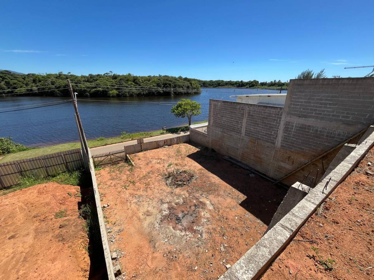Terreno á venda  360m² , por R$ 330.000,00 ,frente para lagoa em  Nova Guarapari - Guarapari/ES - Del Credere Imóveis